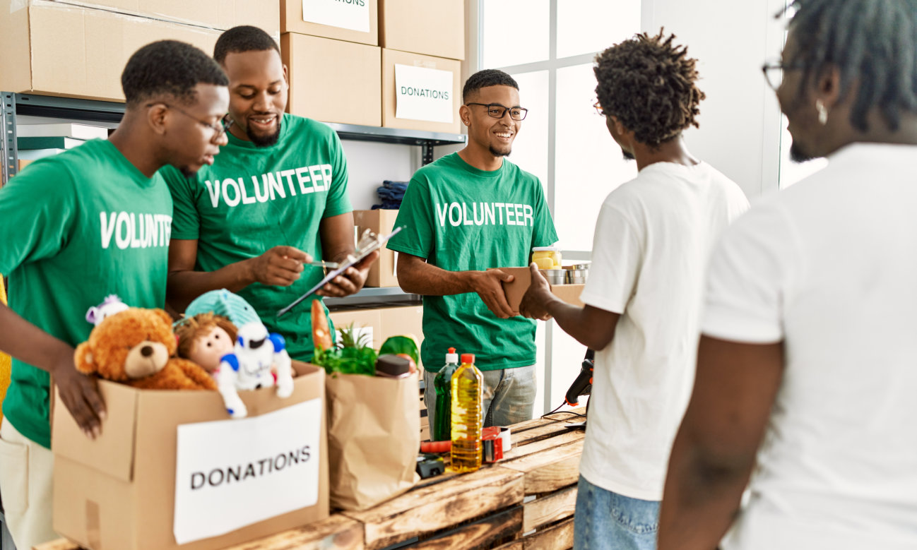 volunteers packing foods and stuff toys